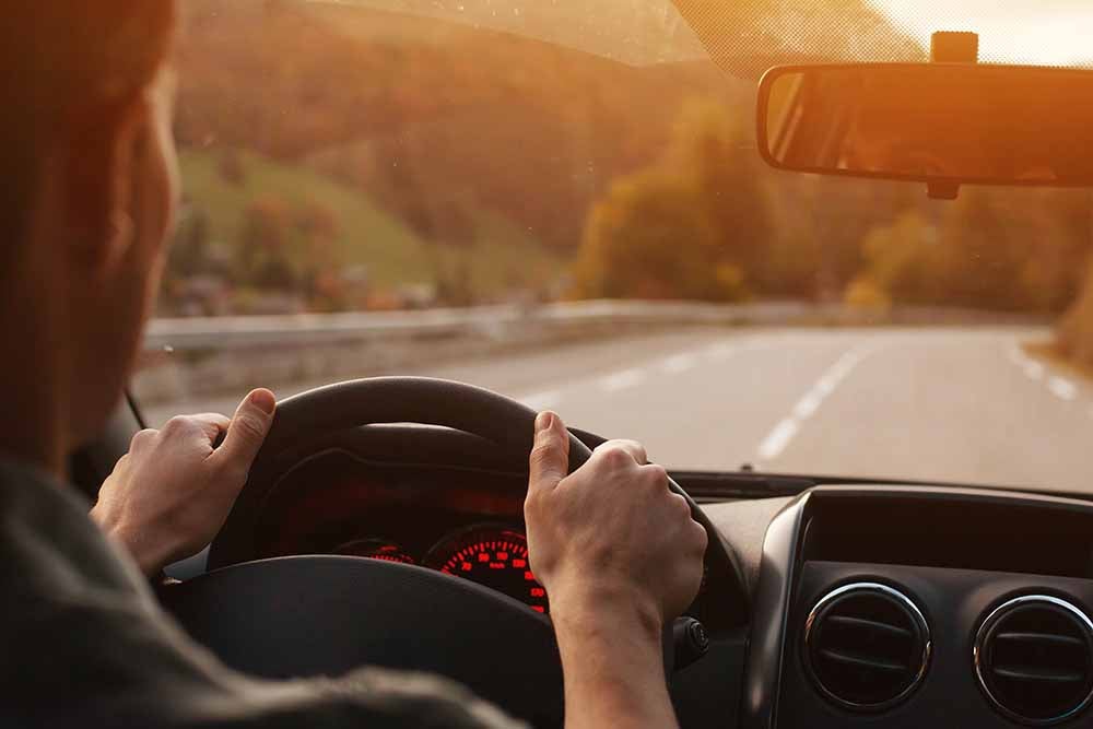 Man driving a car
