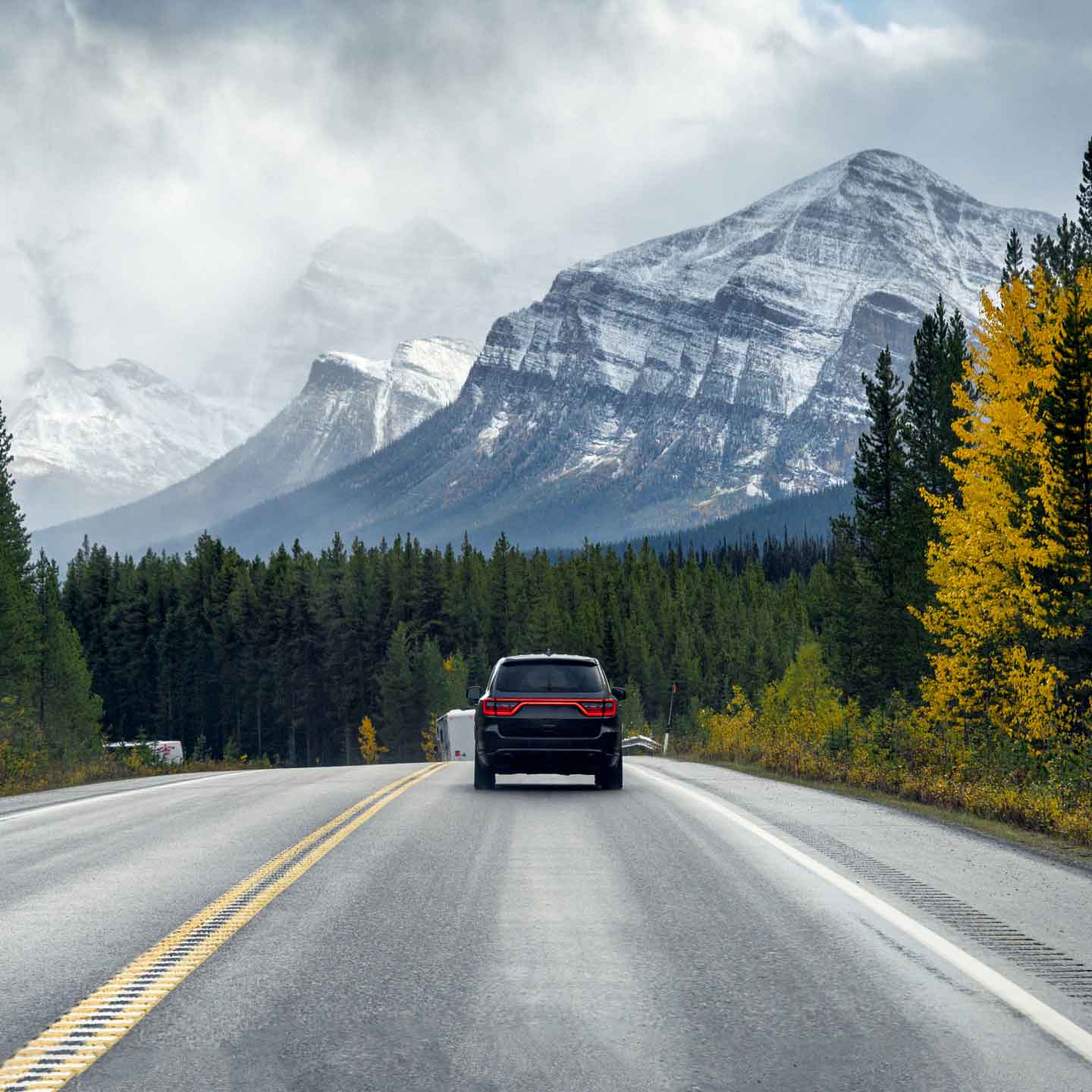 Sonnet insured car driving down a Canadian road