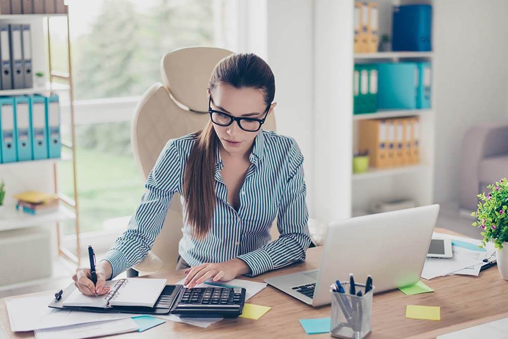 Accountant calculating finances