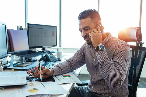 Accountant working at an office desk