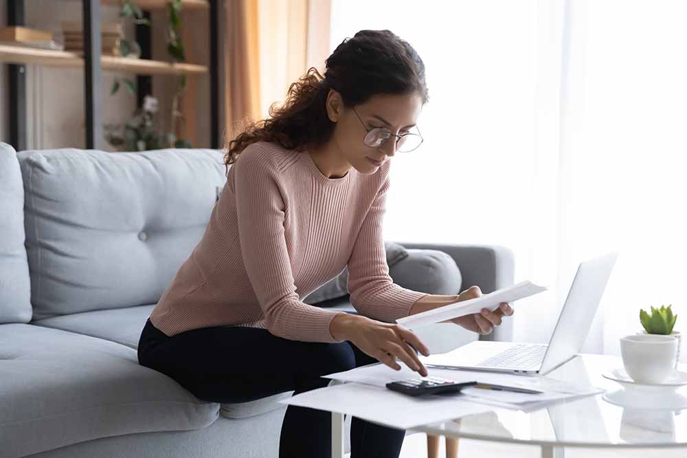 Woman calculating a budget