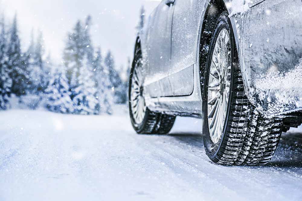 Car on a snowy winter road