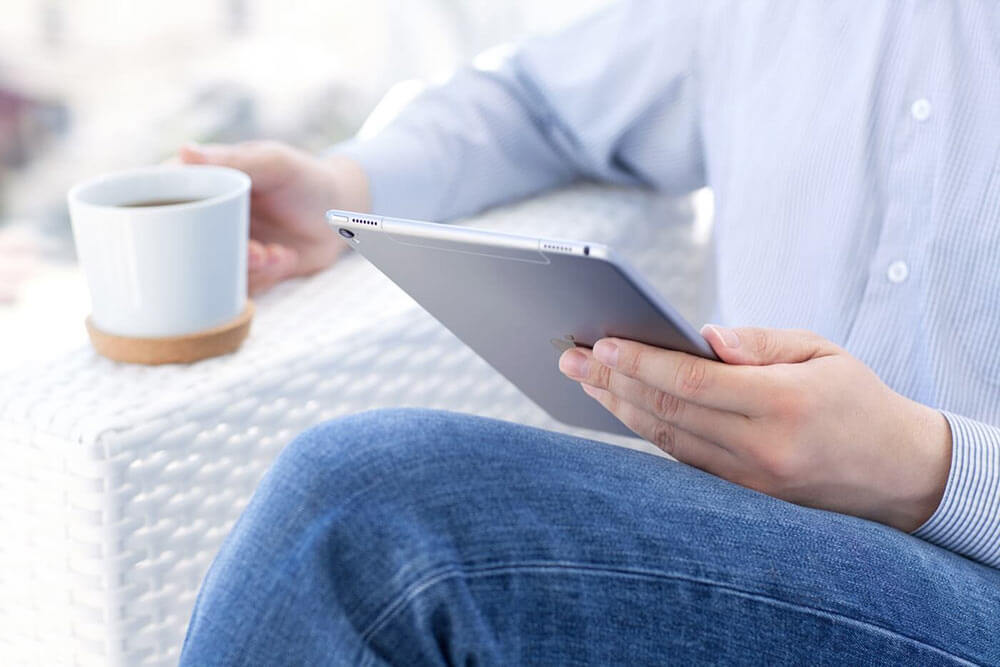 Woman reading about overland water coverage