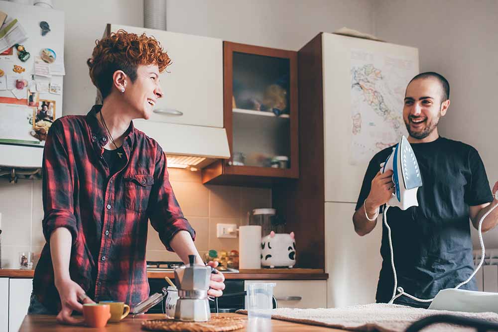 Roomates in their kitchen of their apartment