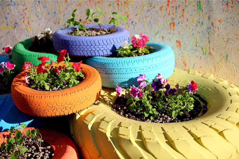 Coloured tired re-used as eco-friendly planters