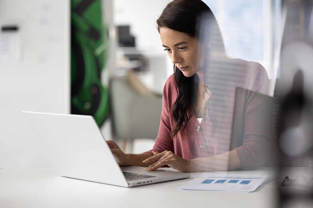 Female accountant working on a laptop