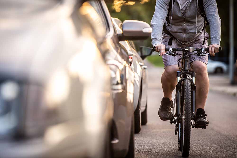 Cyclist on the road with traffic
