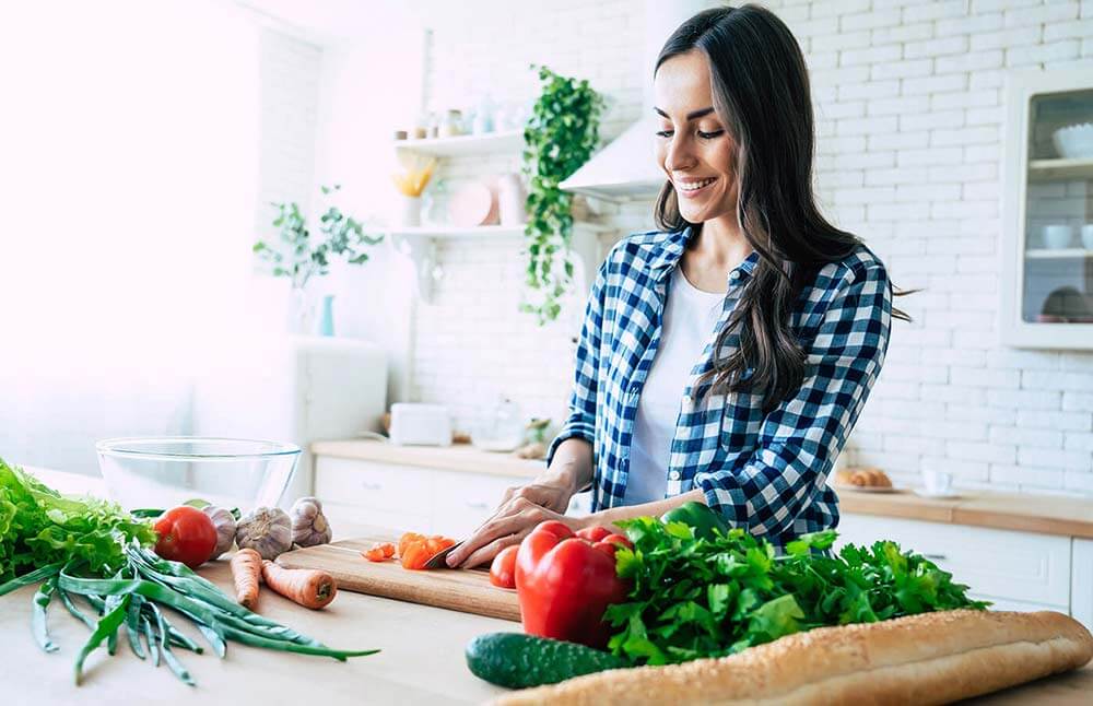 Woman preparing vegetables