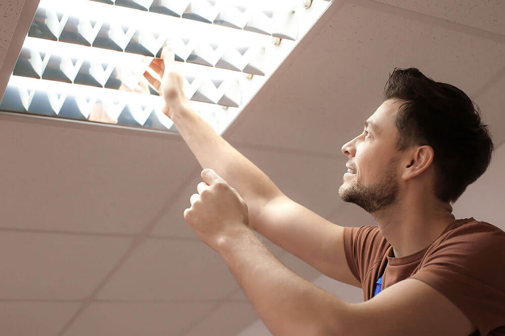 Man changing lightbulb