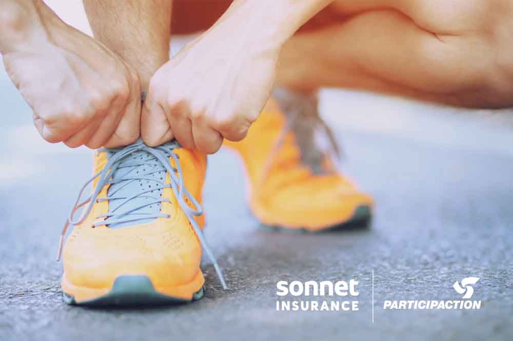 Person lacing up running shoes