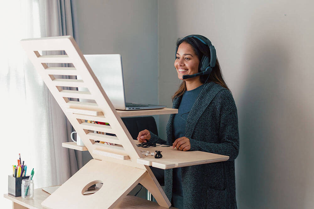 Woman working at an ergonomic desk