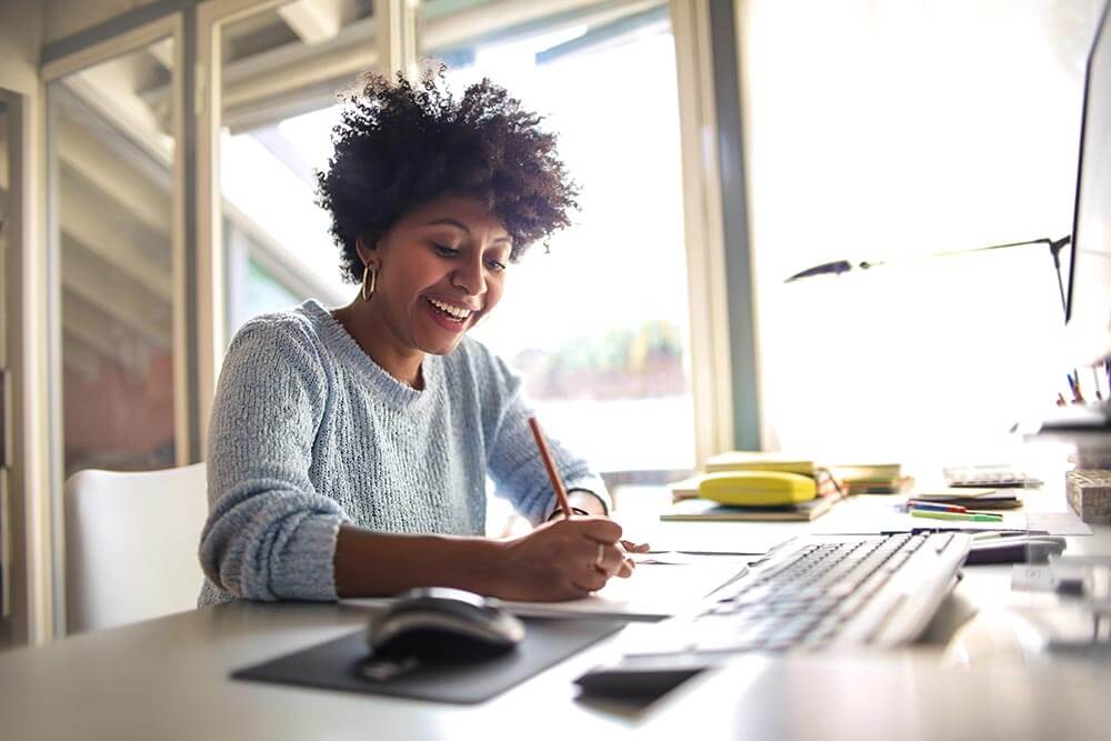 Woman comparing home insurance quotes