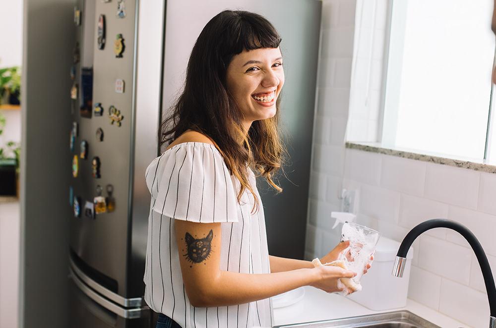 A woman washing dishes