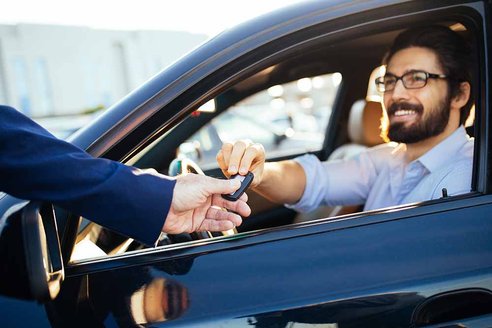 Man purchasing a used car