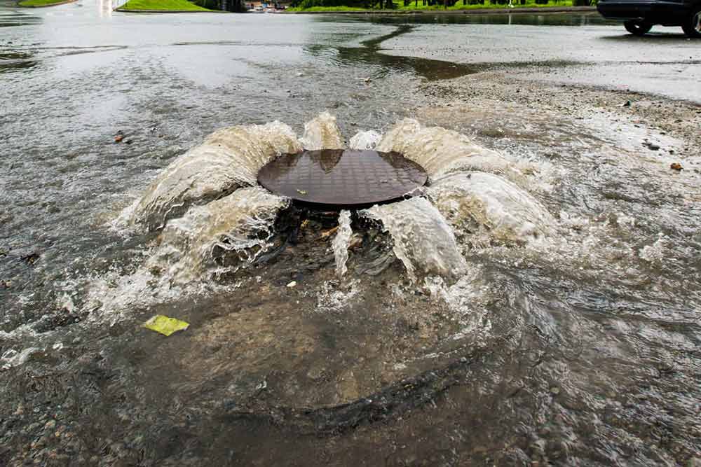 Sewer overflow onto the road