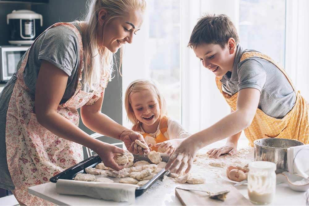 Kids helping cook in the kitchen