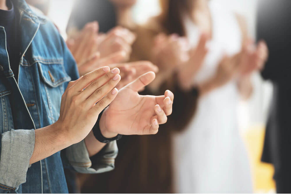 Closeup of hands clapping