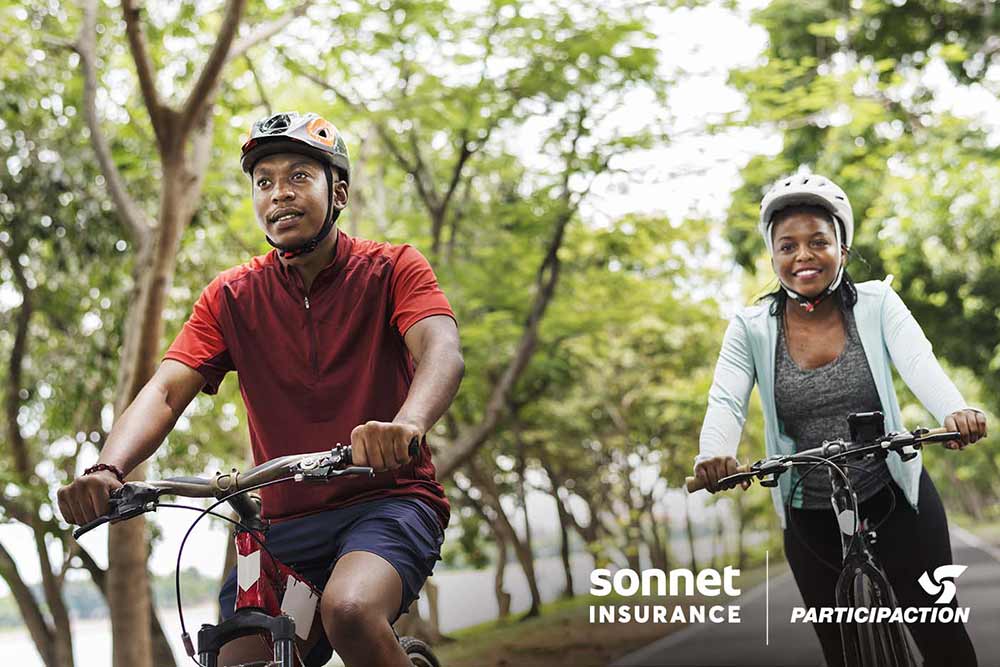 Cyclist couple riding in a park