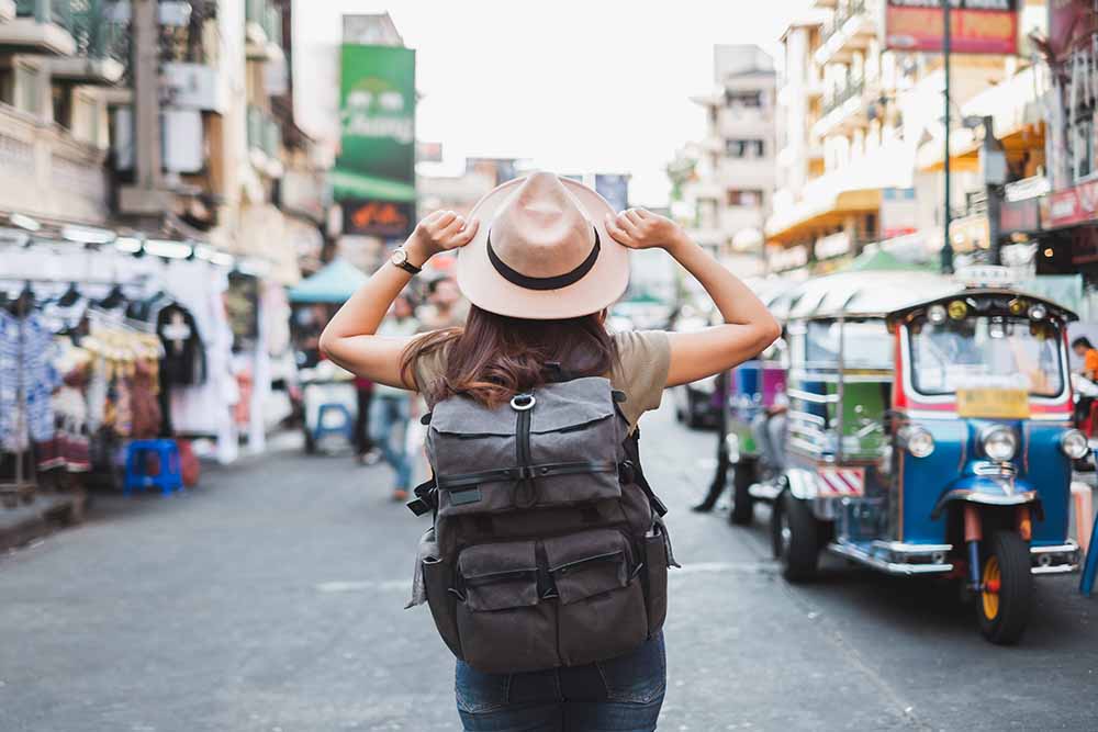 Female tourist wearing a backpack