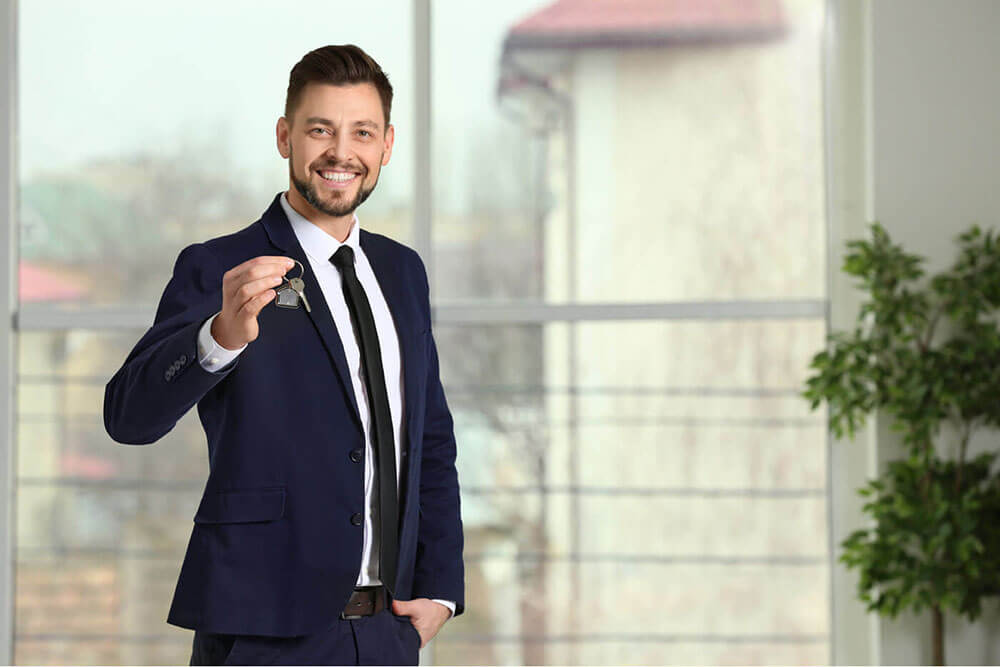 Mortgage broker with house keys