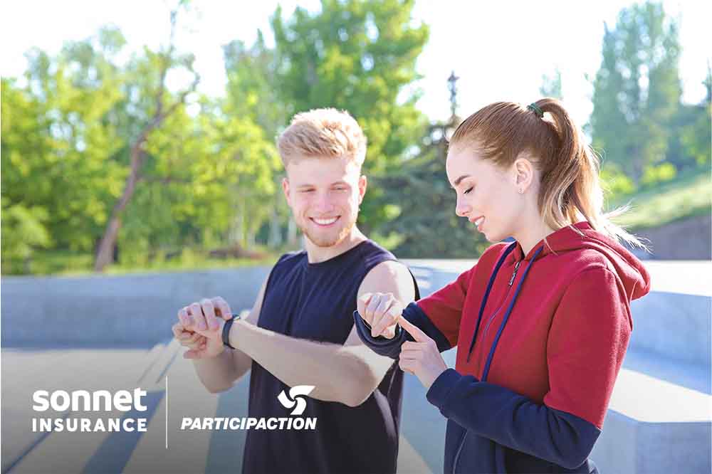 Young man and young woman checking their heart rates