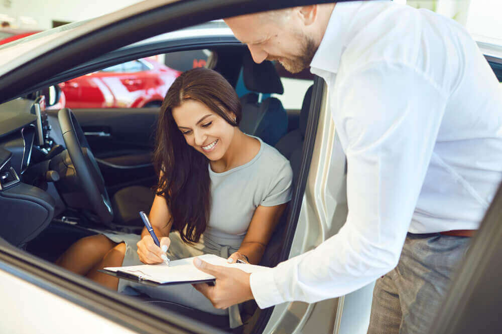 woman renting car with auto insurance