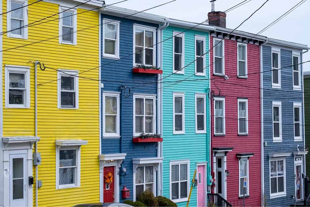 Row of brightly coloured brick houses