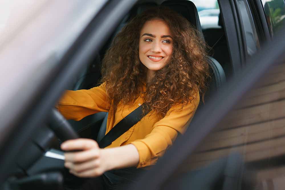 Woman driving a car
